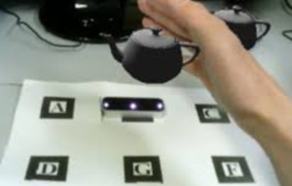 Hidden-Surface Processing for Interaction of Hand and Virtual Objects Using Leap Motion Controller